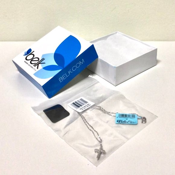 0.033 ct. t.w. Diamond Cross Pendant in Sterling Silver - Picture 2 of 3